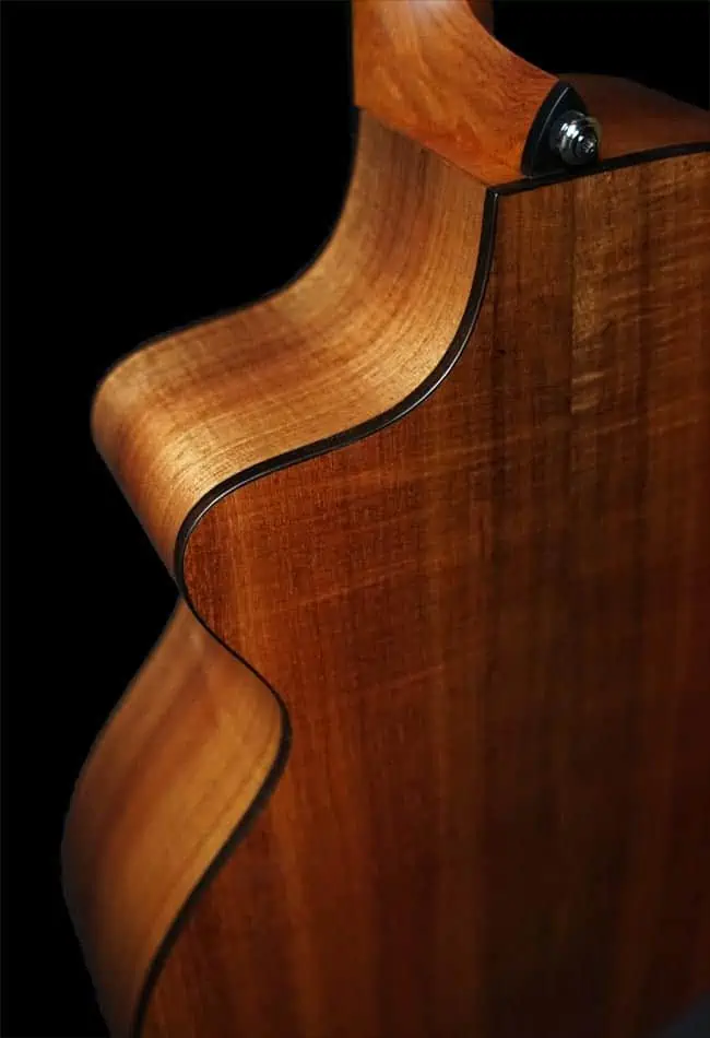 Solid timber end graft and bindings of the Fenech VTH Series Acoustic Guitars