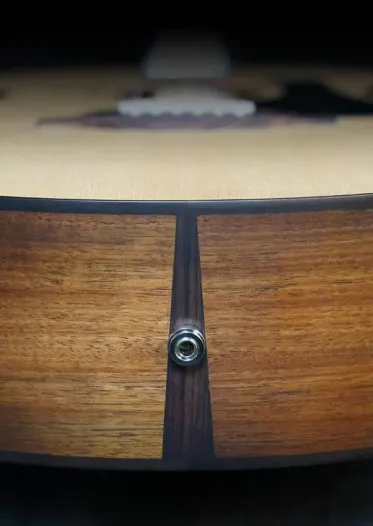 Solid timber end graft and bindings of the Fenech VT Series Acoustic Guitars